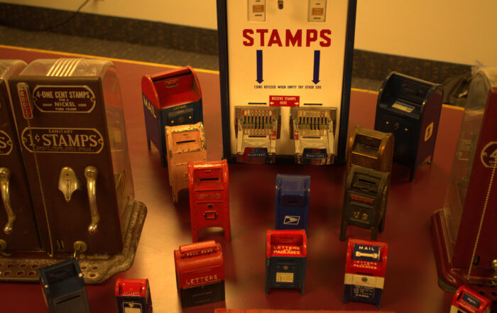 A collection of stamp dispensers and holders