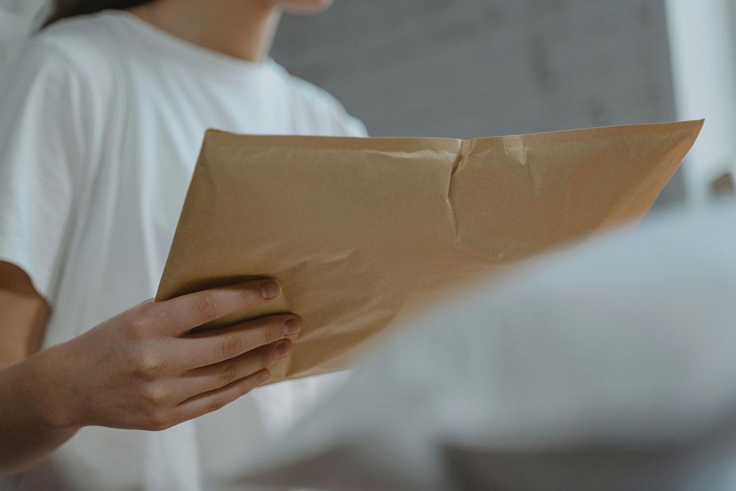 Business owner mailing documents.