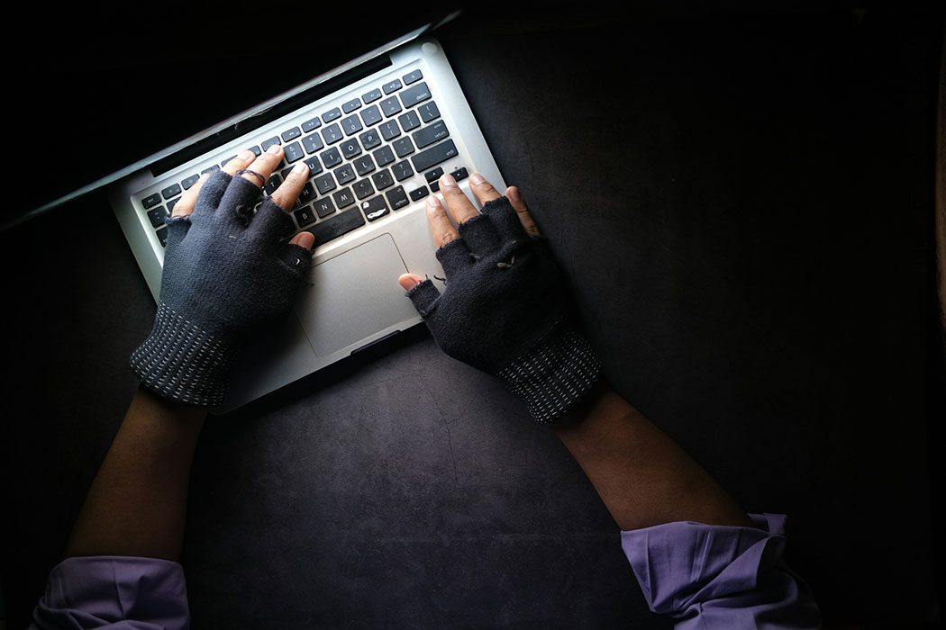 Person typing on a laptop